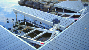 R&J Machine Aluminum Roller Ramp Systems installed with Aluminum Truss Grey Decking Pipe Dock 