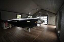 Hidden Beam Wet Slip Lift with decked platform- Boathouse fabrication by Greenway Construction