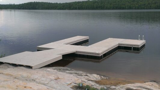 Permanent steel shore section to floating u shaped dock