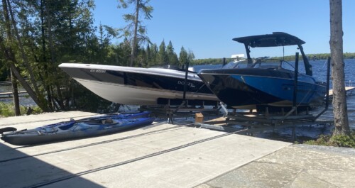 Large boats on metal railways in concrete
