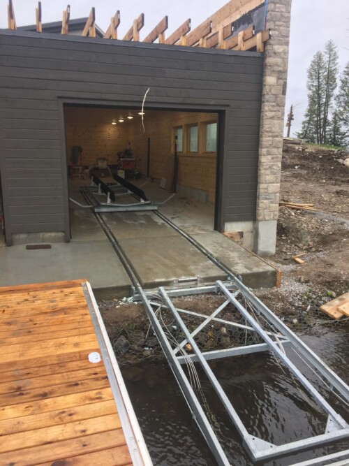 Railway leading into a composite boathouse