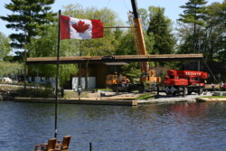 Crane Lifting Steel Floater into the water-Proudly Canadian Made