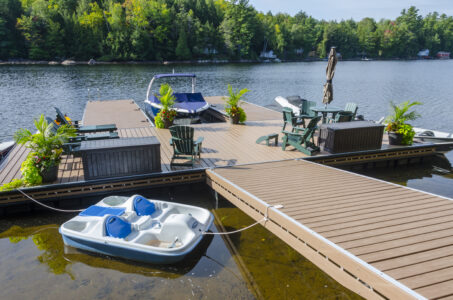 Floating dock system with tapered ramp
