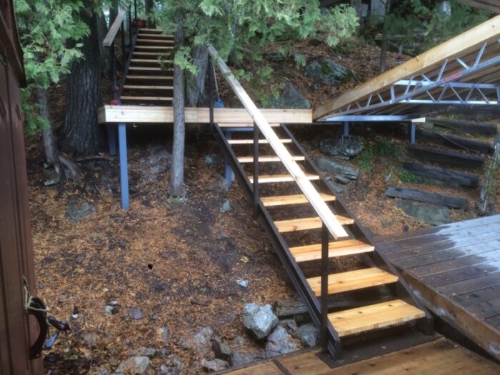 Steel stairs snd landing with wooded treads