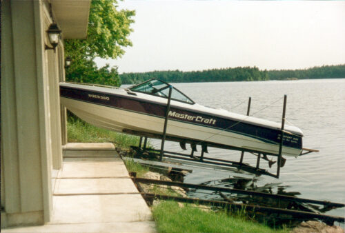 Marine railway into dry slip boathouse