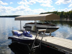 Cantilever Boat Lift with a Tan Canopy