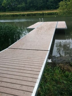 Long Wave X dock extending out into a lake.