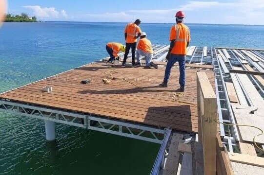 Works placing decking on a metal frame