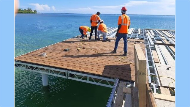 Works placing decking on a metal frame