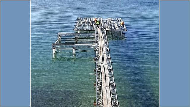 Large metal frame on a lake