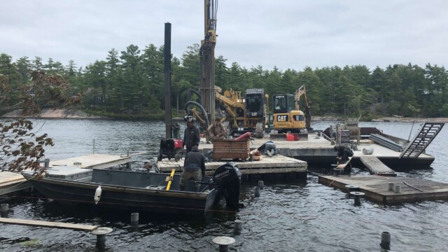 Heavy machinery on a platform on water