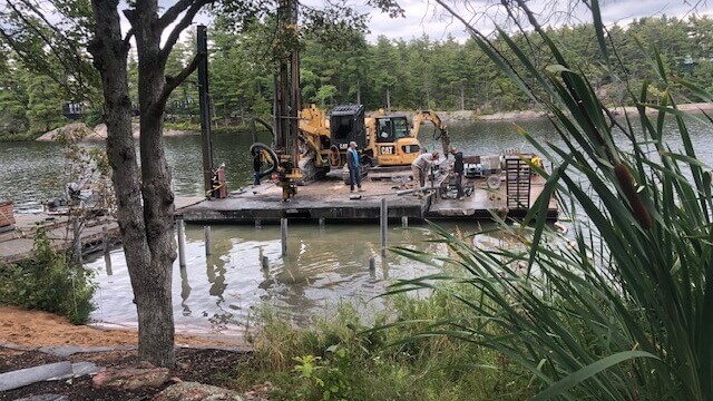 Heavy machinery on a platform on water