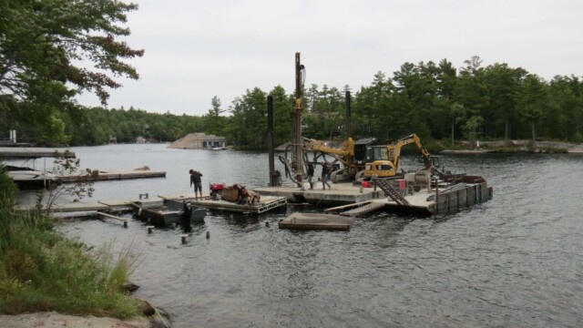 Heavy machinery on a platform on water