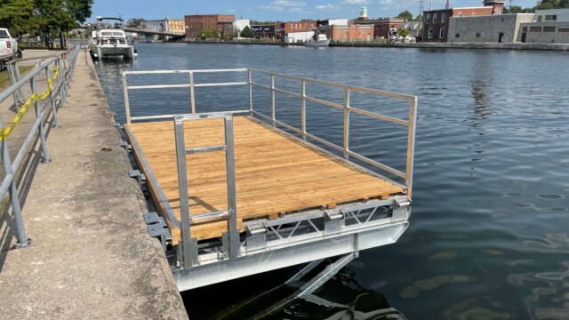 Small wooden dock placed on shore