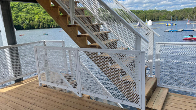 Wooden stairs and metal railings on a dock
