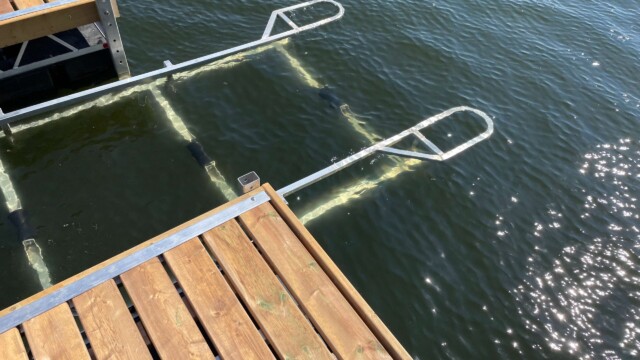 Metal boatlift in a lake