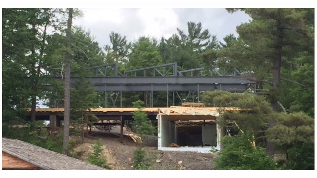 Metal framing in the woods for a large structure